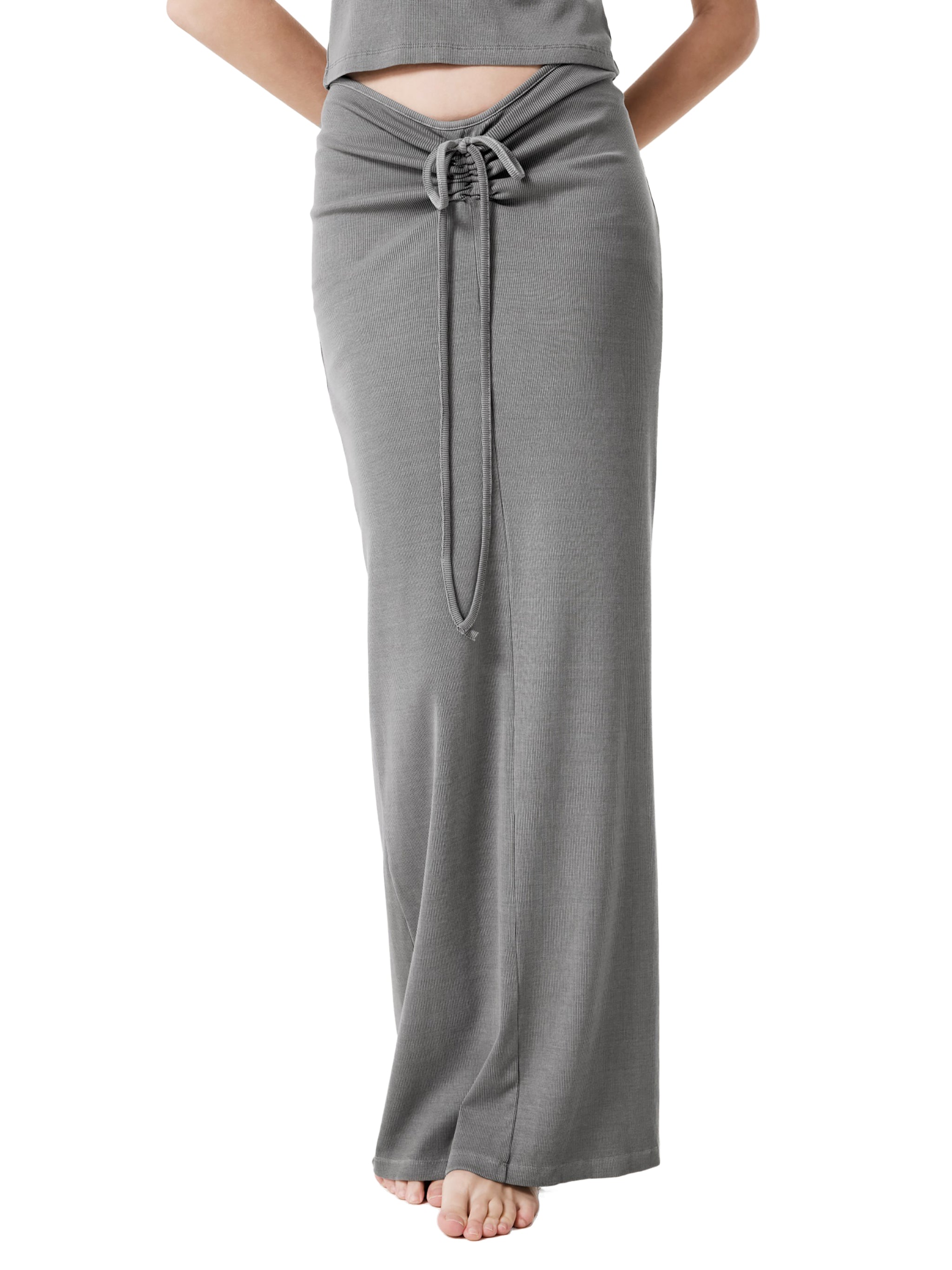 Model wearing a medium gray mineral wash drawstring maxi skirt in a celestial streetwear style.