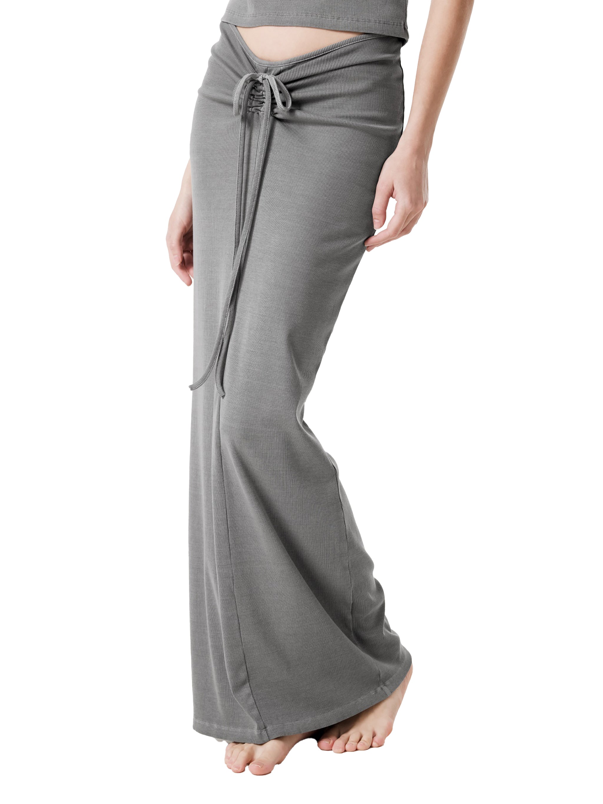 Model wearing a medium gray mineral wash drawstring maxi skirt in a celestial streetwear style.
